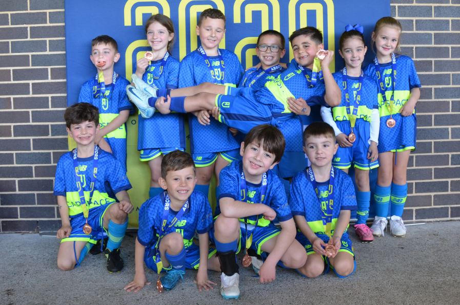 An AJFC Mini-Roos mixed team at our Mini-Roos Presentation day