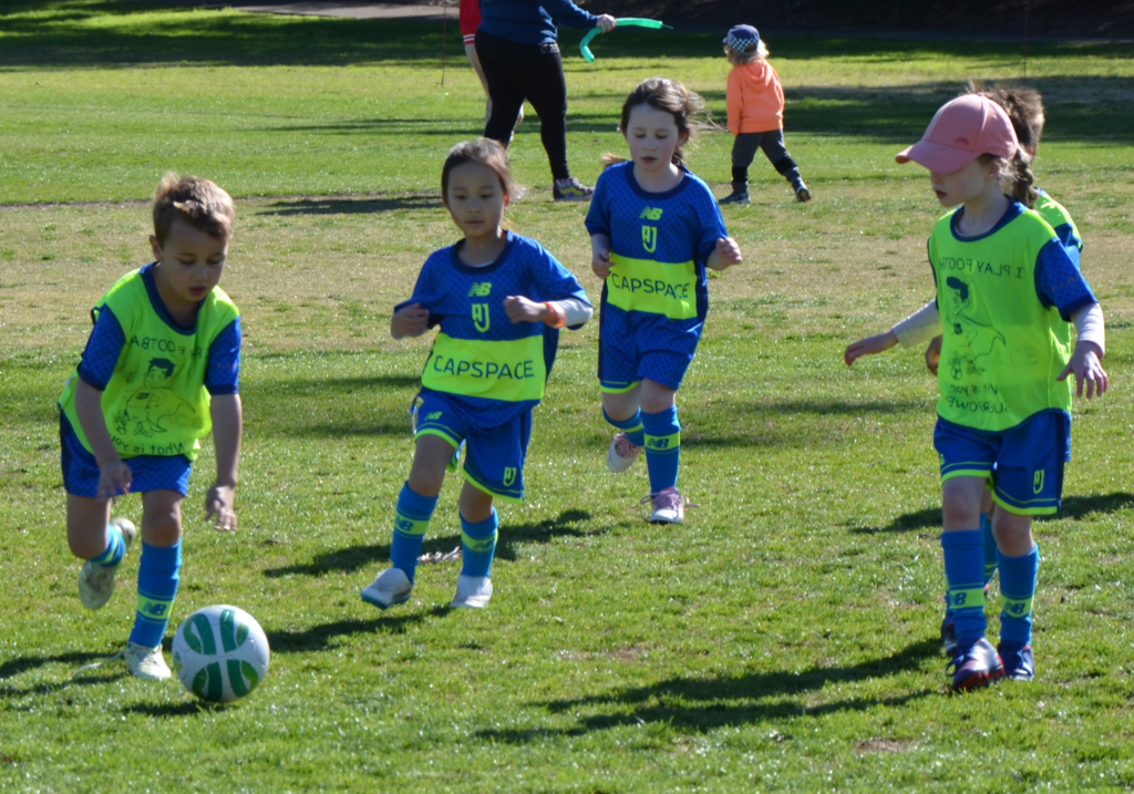 Mini-Roos football action at Campbell Park