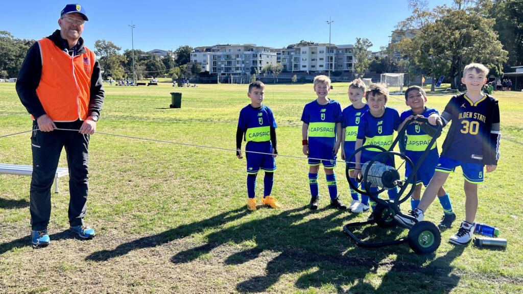 A helping hand from the AJFC Under 8 Boys for pitch pack-up